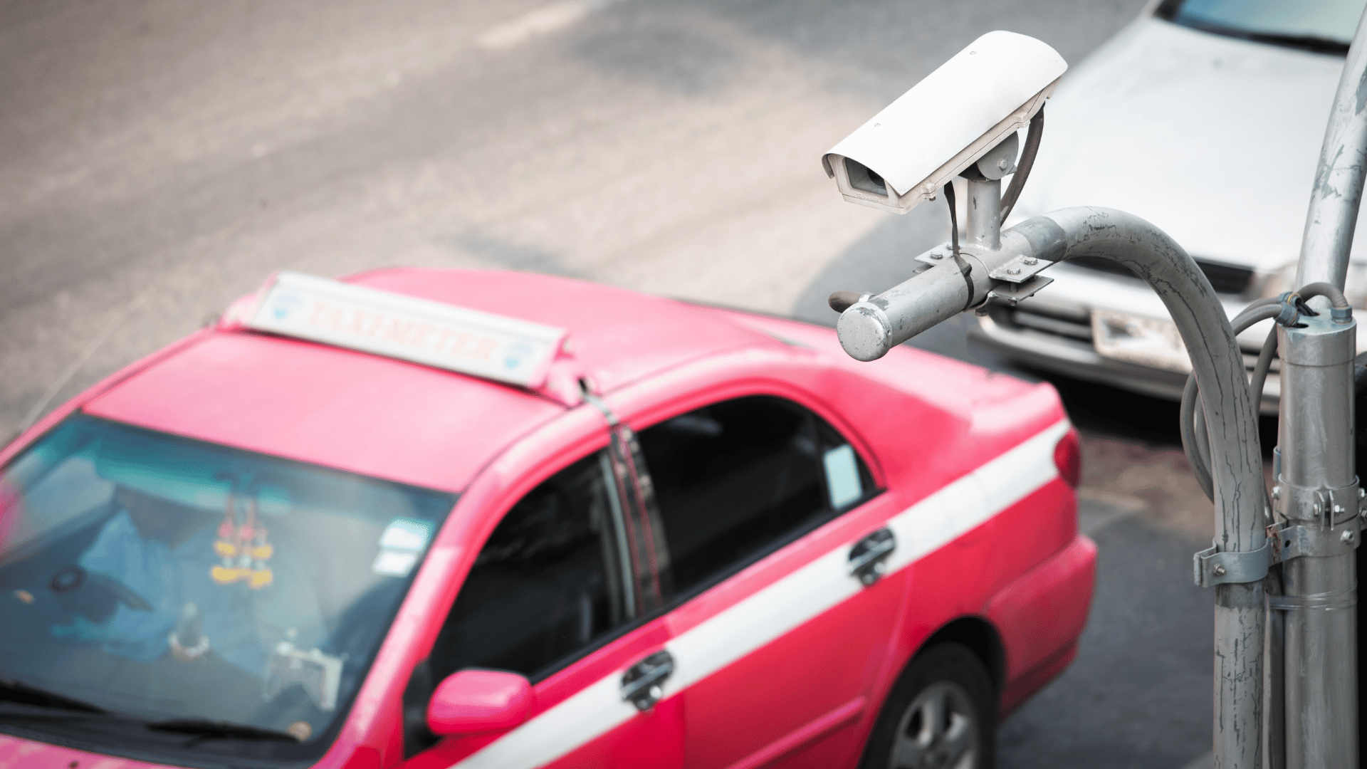 CCTV camera overlooking cars in the street